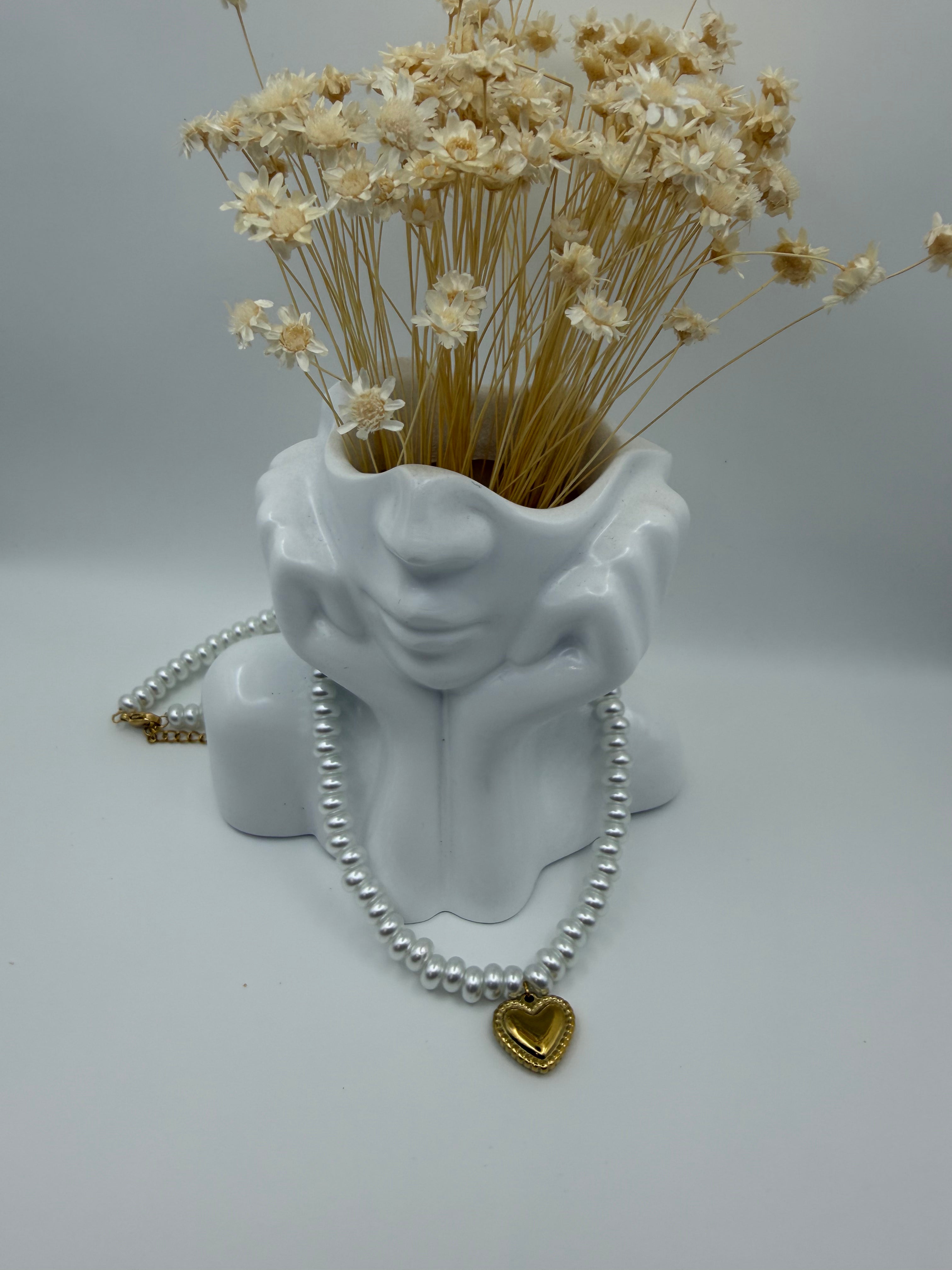 Necklace of pearl and heart